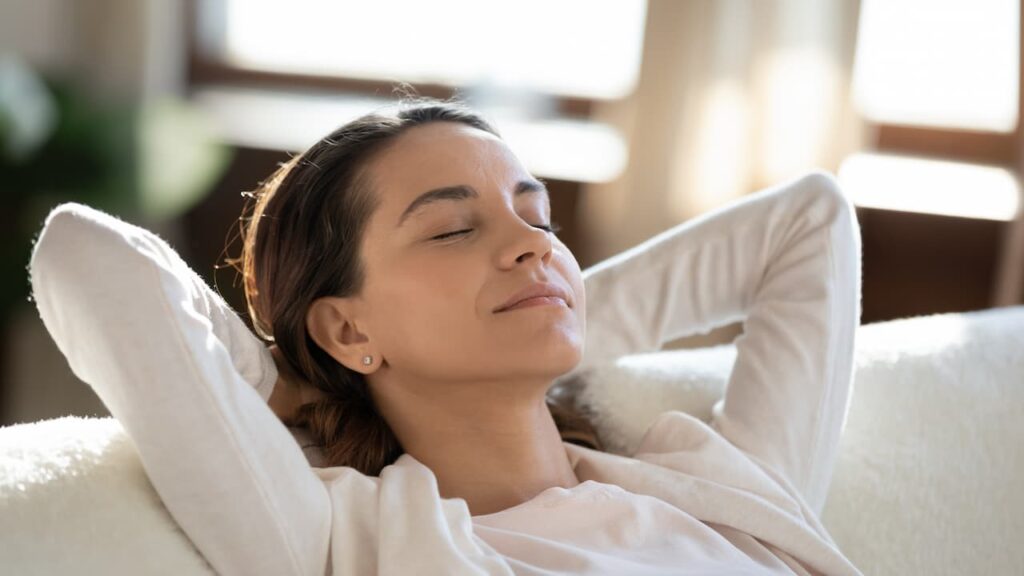 young woman in white relaxing