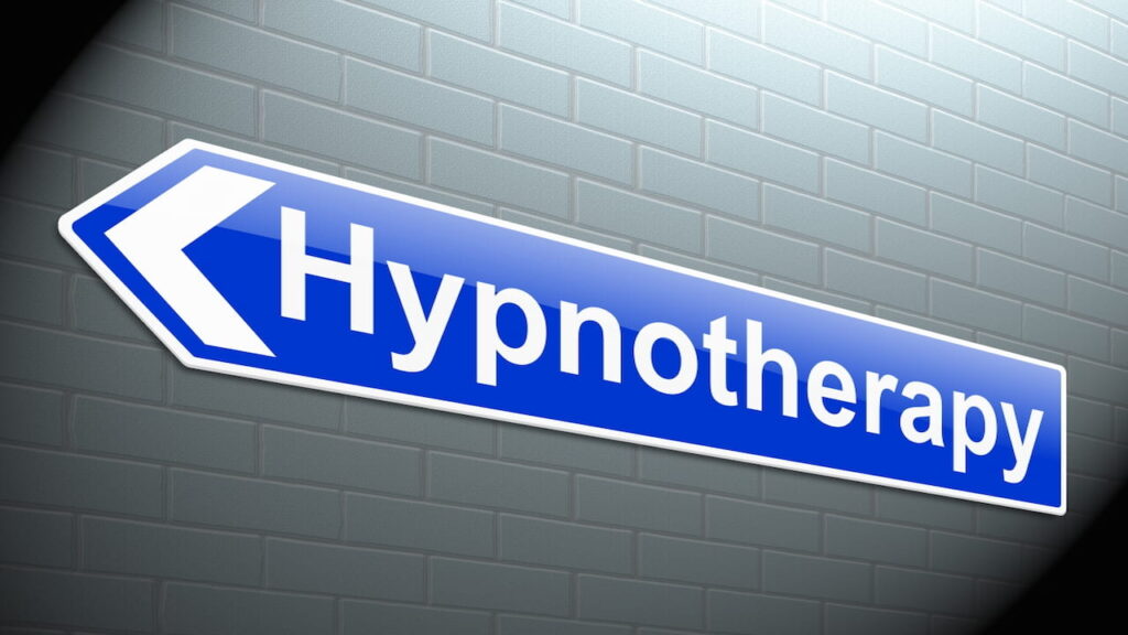 A sign showing the way to the hypnotherapy