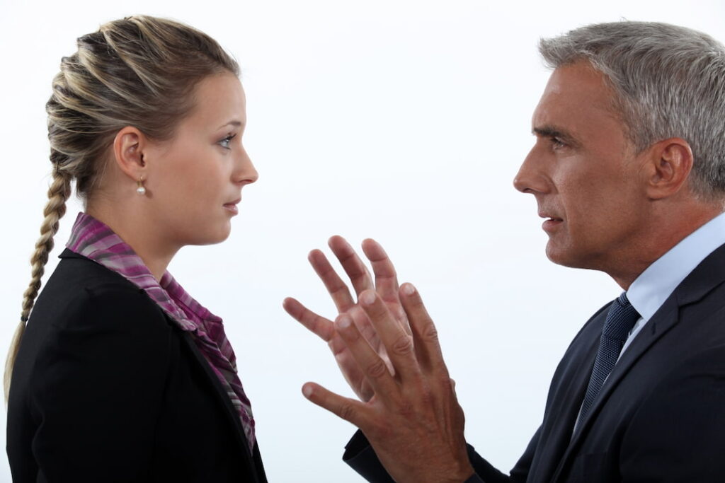 a man hypnotizing a woman