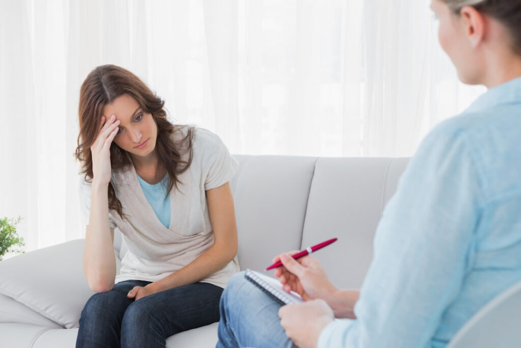 a woman visiting the hypnotherapist