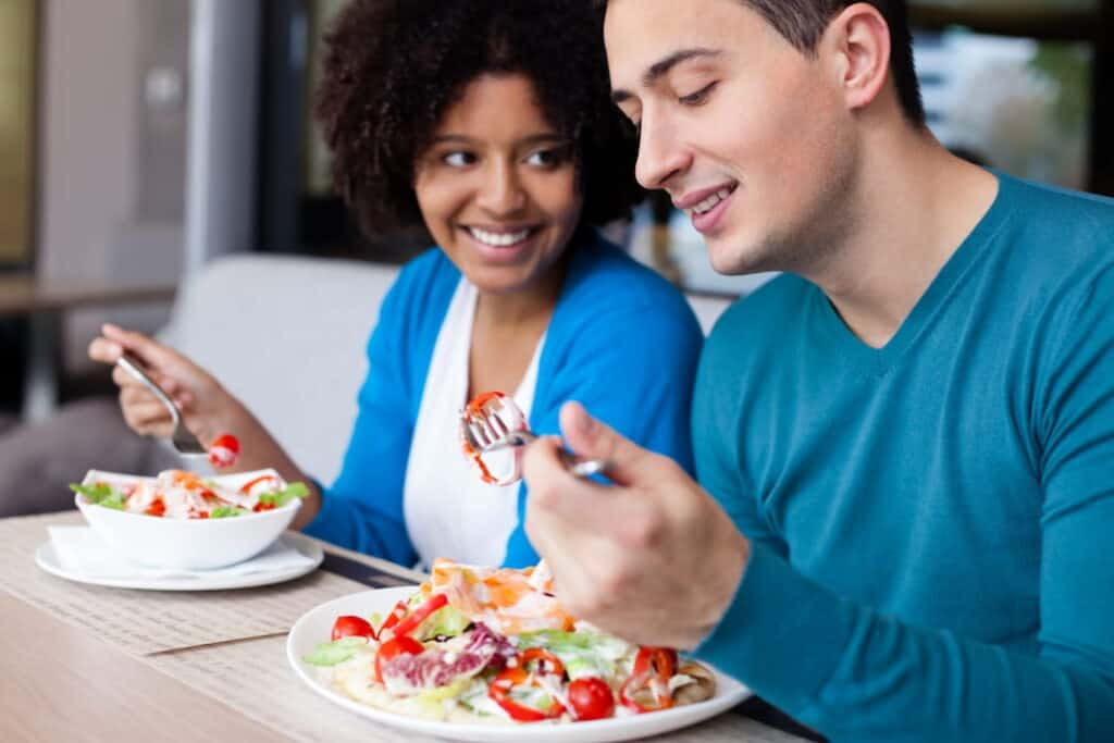 a couple eating together