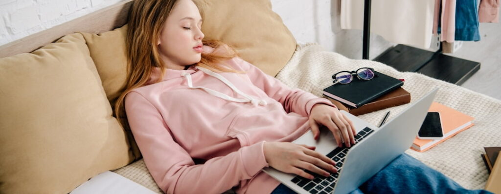 a girl using her laptop for self-hypnosis