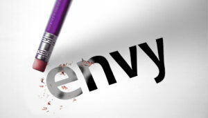 erasing the word ENVY