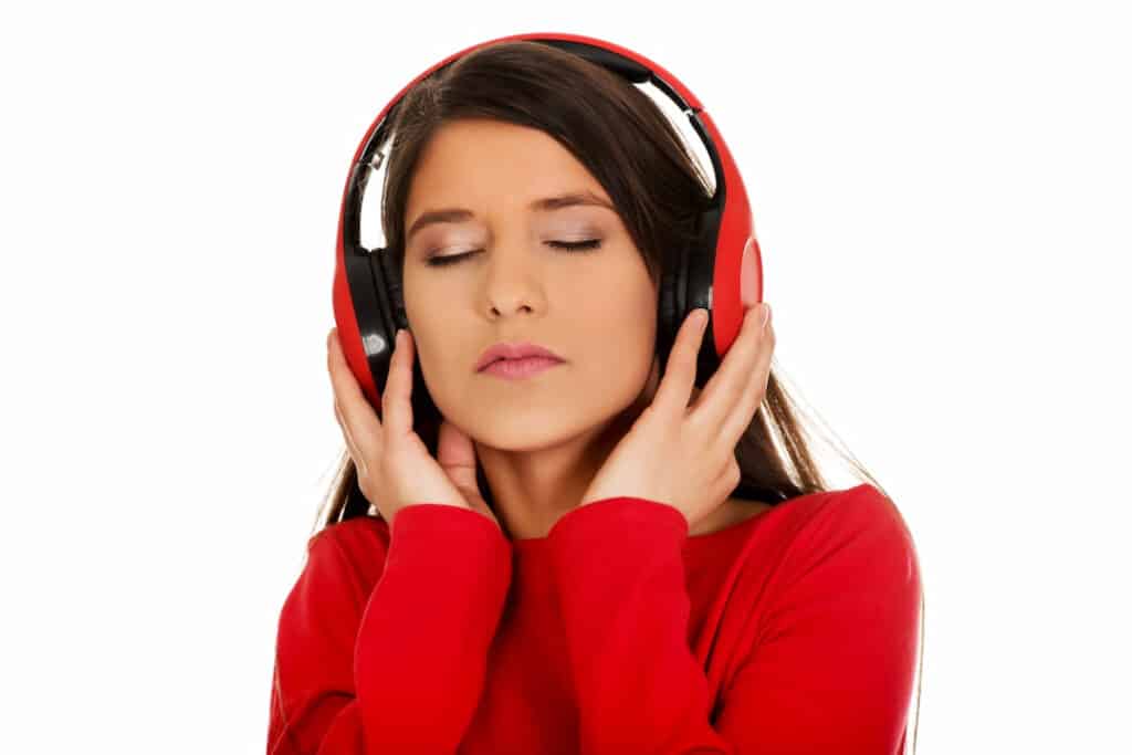 girl in red listening to audios 