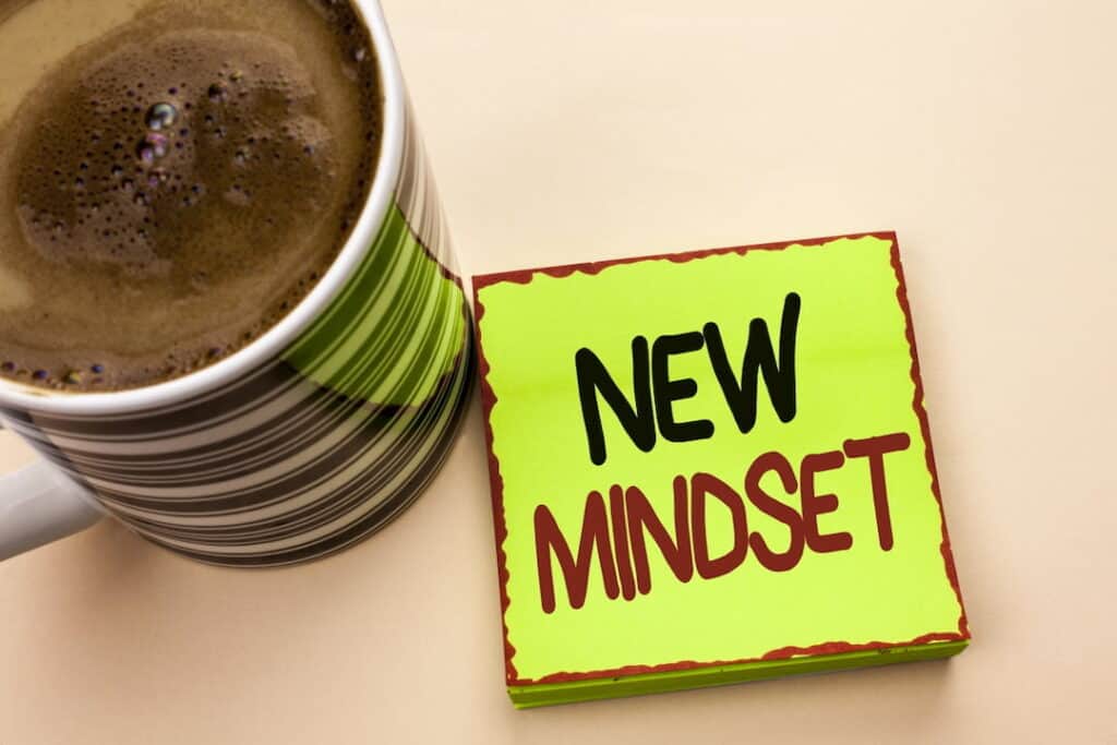 new mindset note and a cup of coffee