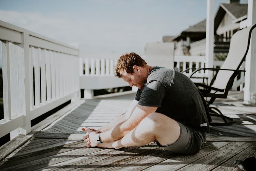 a man meditating outdoors