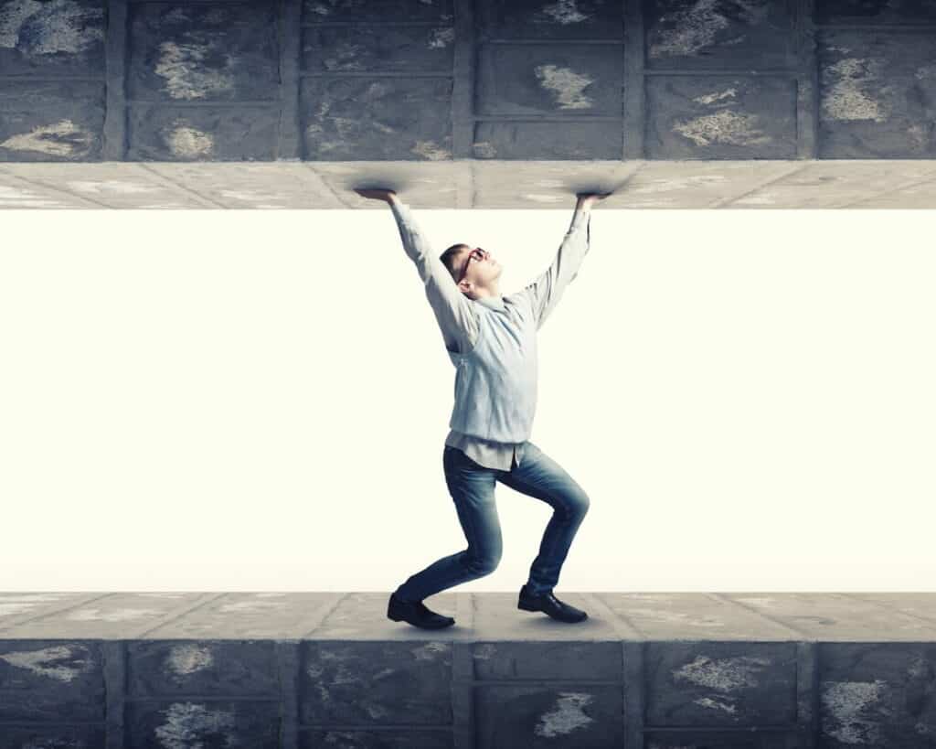 a person holding a ceiling to stop it falling down