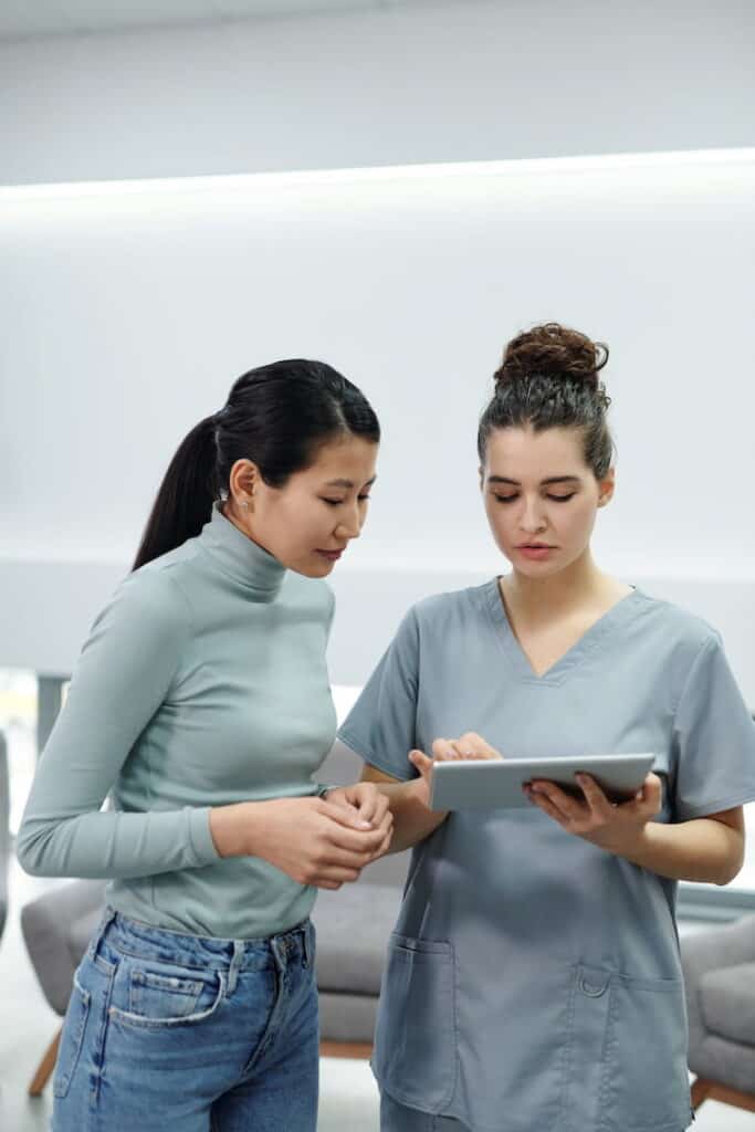 a woman consulting a doctor