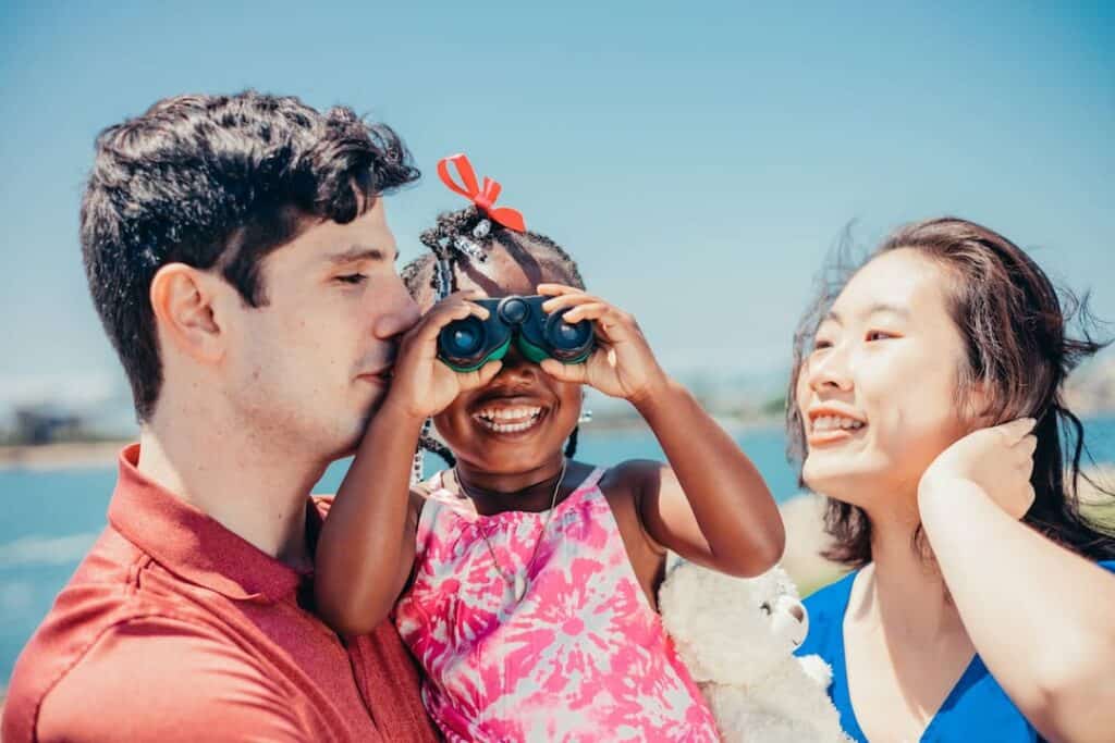 adopted little girl with her parents