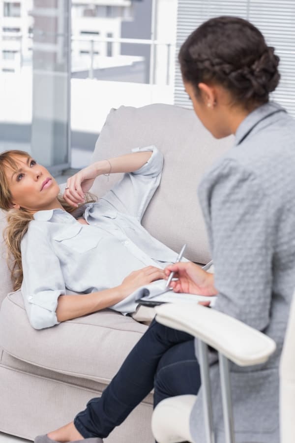 a woman visiting hypnotherapist