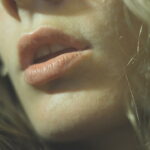 a closeup of woman's mouth