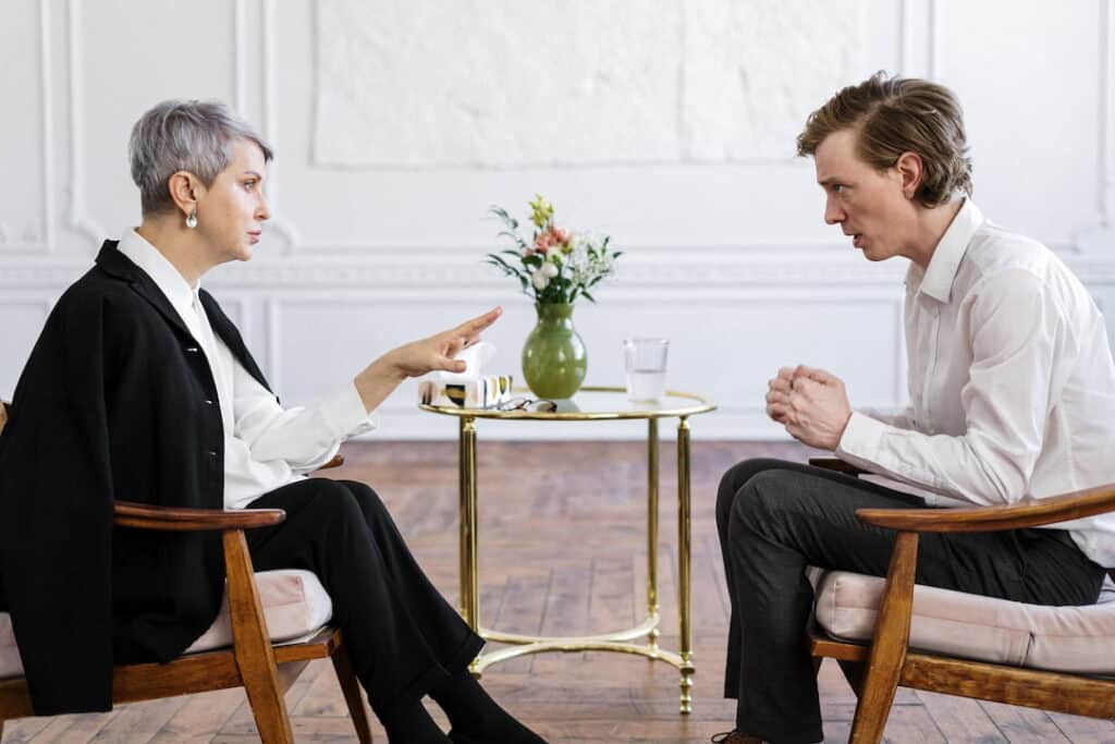 a therapist and a patient during the therapy session