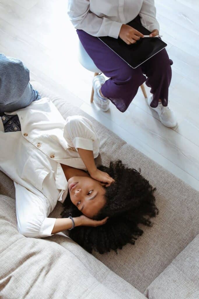 a woman on the couch during the therapy session